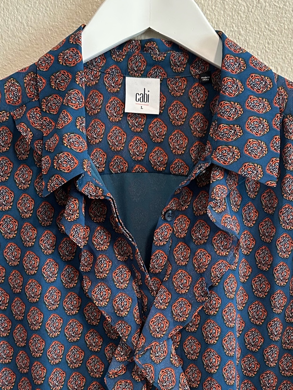 ☀️ CAbi Medallion Reign Sleeveless Blouse with Ruffle